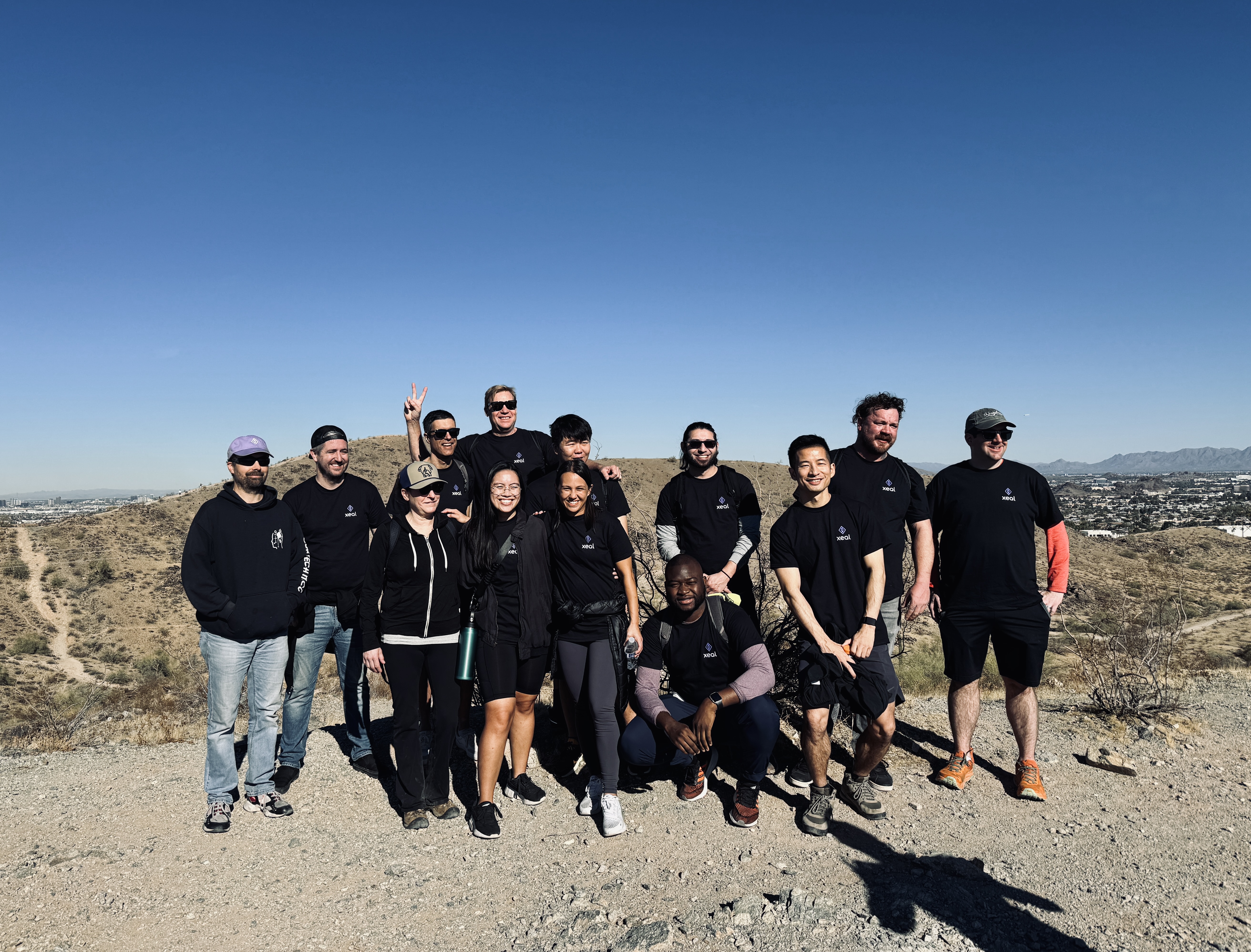 Team hike above the desert